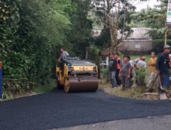 Pemdes Desa Cicadas Realisasikan Pembangunan Jalan dengan Hotmix