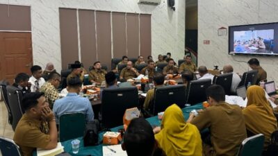 Secara Daring, Bupati dan Wabup Pelalawan Ikuti Launching Buku Panduan Antikorupsi Bersama Kemendagri