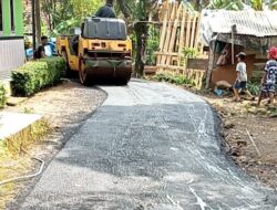 Realisasikan DD Tahun 2026, Pemdes Cipancar Serangpanjang Hotmix Jalan Lingkungan