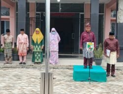 Sekmat Langgam Pimpin Upacara Hari Jadi Kabupaten Pelalawan Ke-27 Tingkat Kecamatan